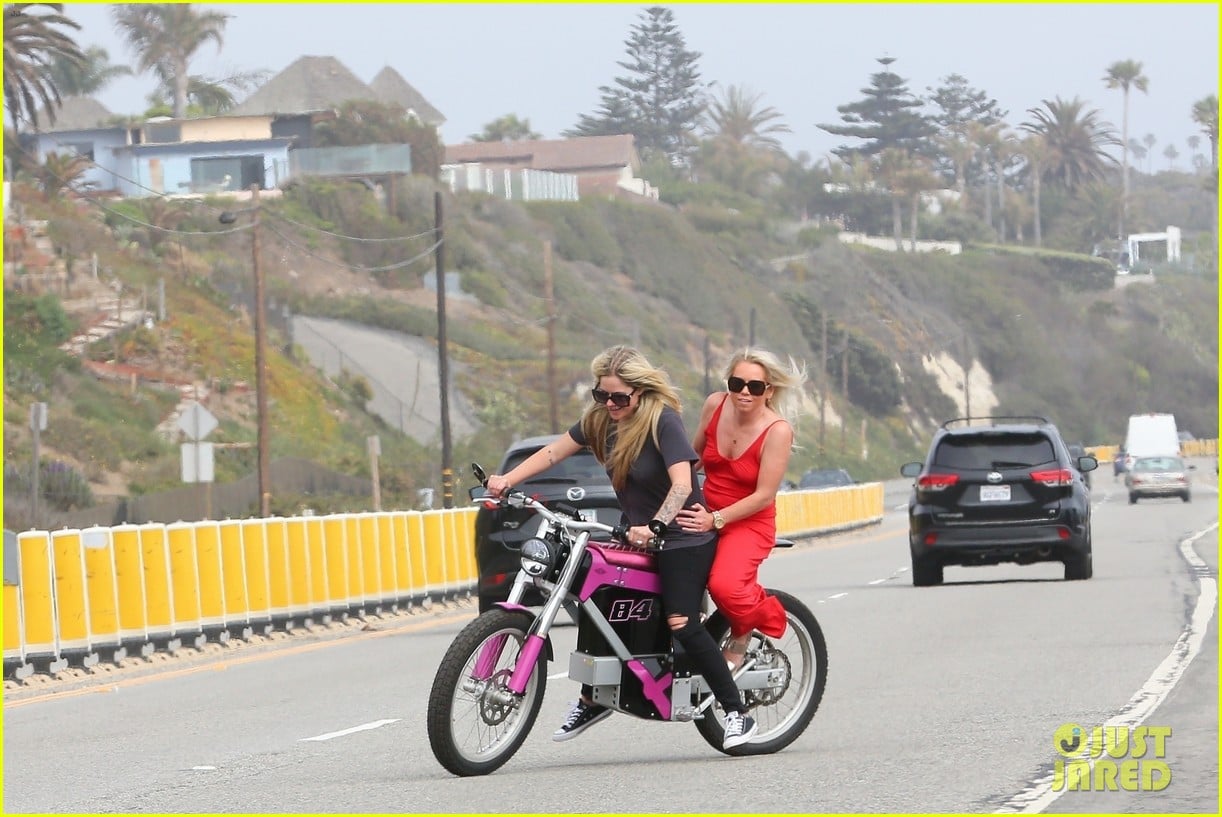 Avril Lavigne Rides A Hot Pink