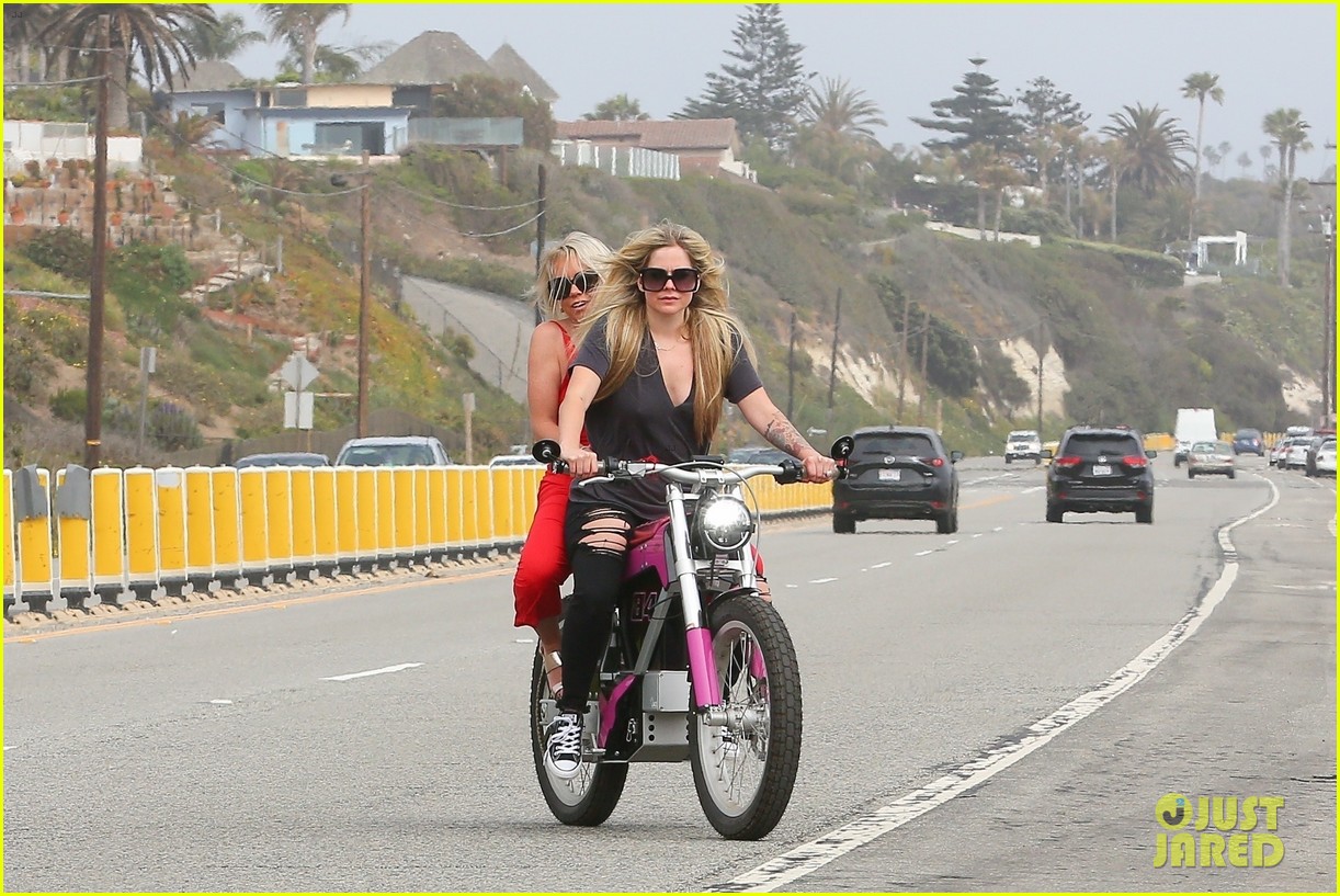 Avril Lavigne Rides A Hot Pink Motorcycle During Memorial Day Holiday