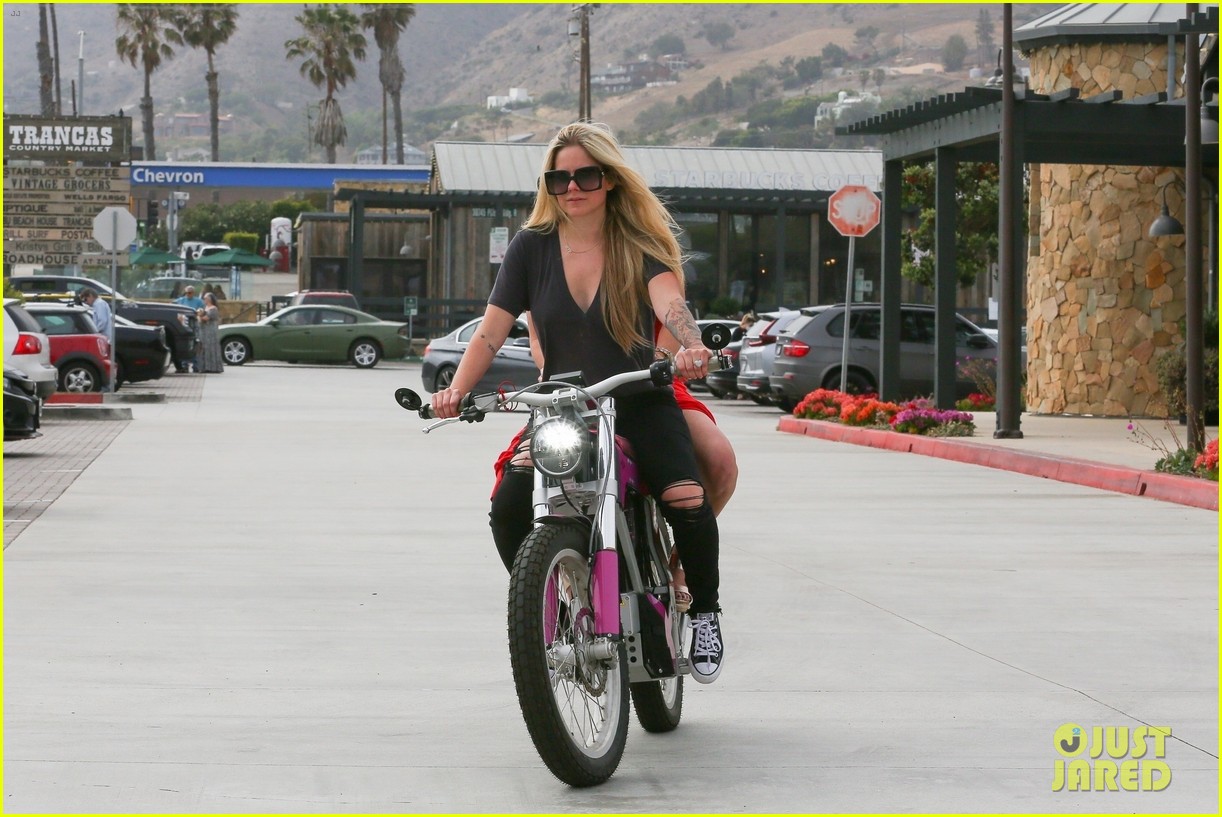 Avril Lavigne Rides A Hot Pink Motorcycle During Memorial Day Holiday