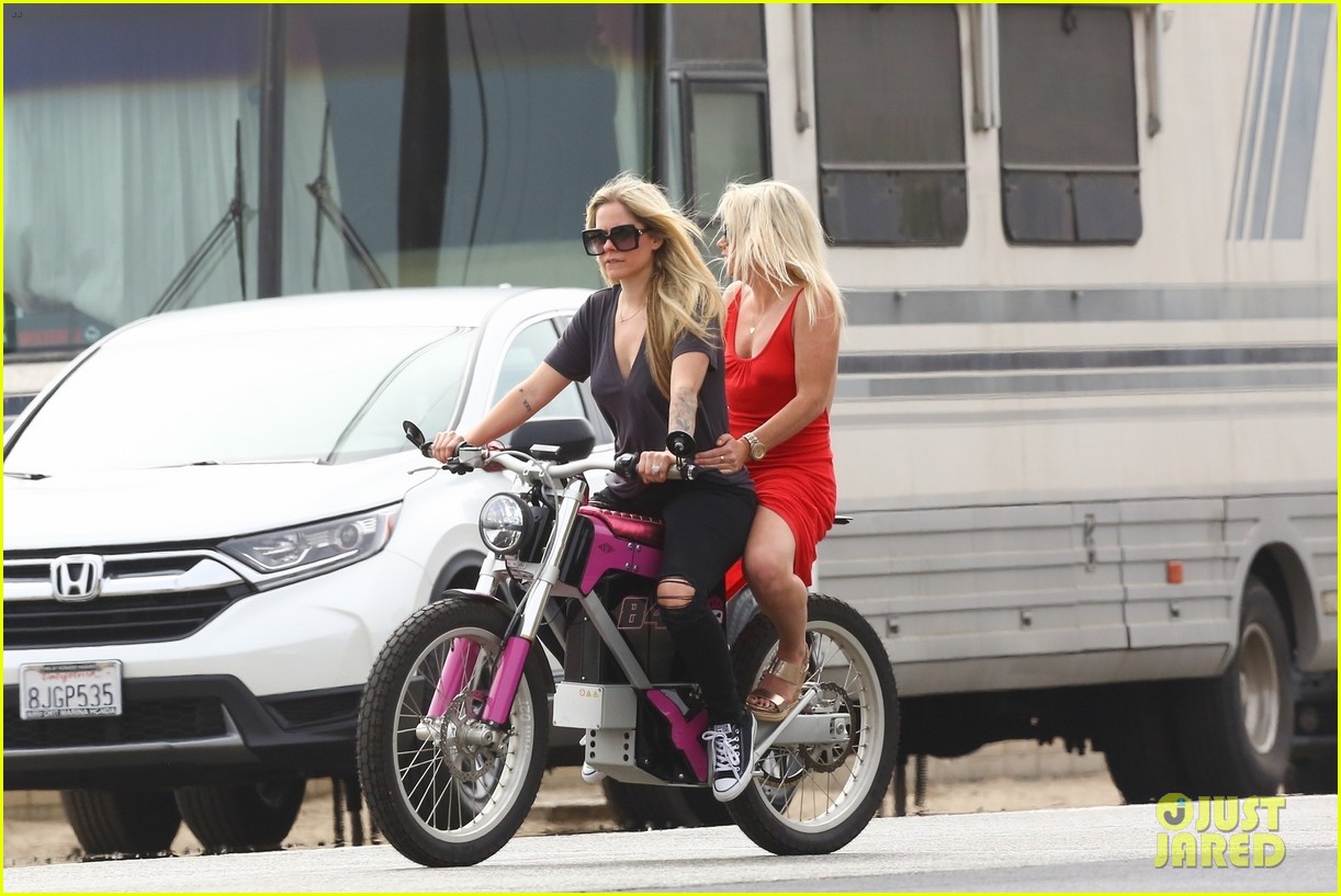 Avril Lavigne Rides A Hot Pink Motorcycle During Memorial Day Holiday