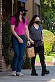 kat dennings fiance andrew wk hold hands shopping 03