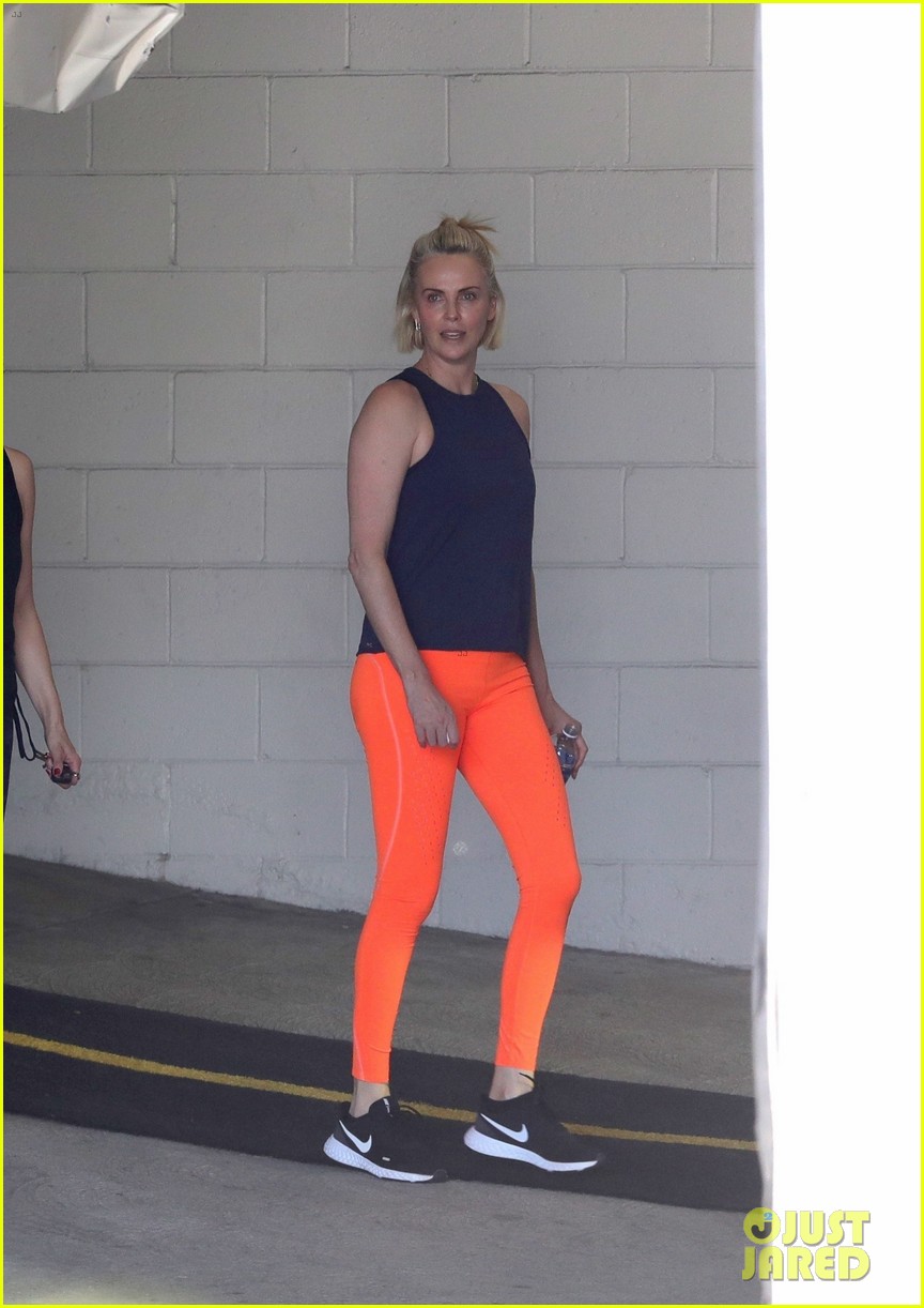 charlize theron orange leggings for workout 03