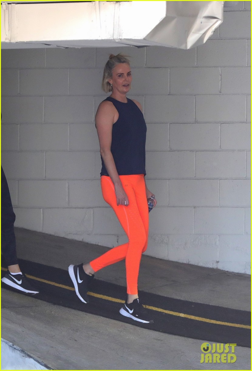 charlize theron orange leggings for workout 05