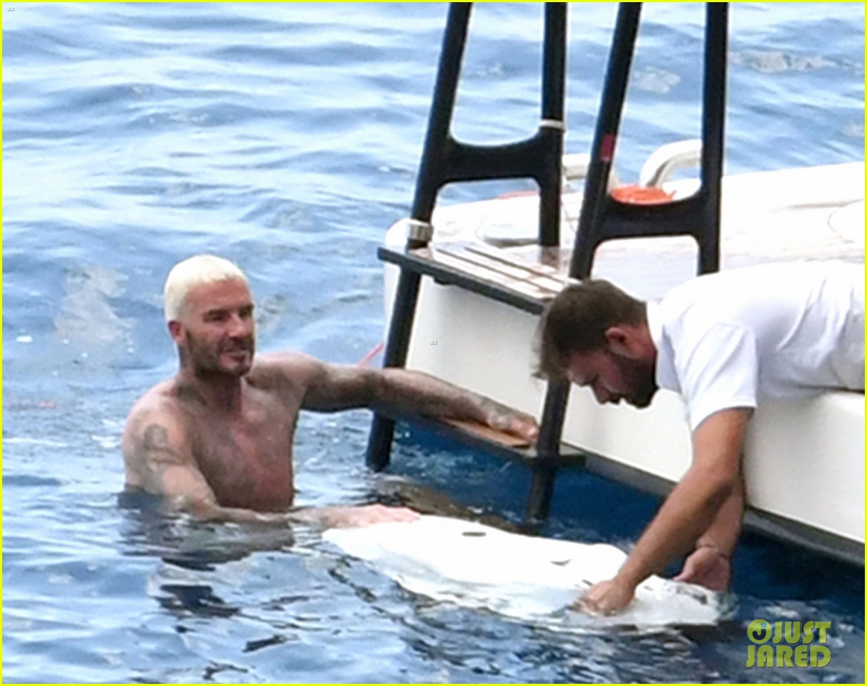 David Beckham Jumps Off a Yacht with His PinkHaired Son Cruz Photo