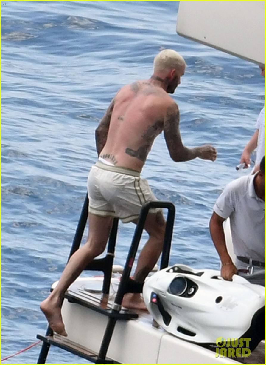 David Beckham Jumps Off a Yacht with His PinkHaired Son Cruz Photo