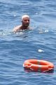 david beckham jumps off yacht with son cruz beckham 53