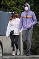 isla fisher sacha baron cohen hold hands day out in sydney 05