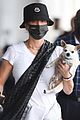 kaley cuoco lands in nyc with her dog dumps 02