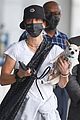 kaley cuoco lands in nyc with her dog dumps 04