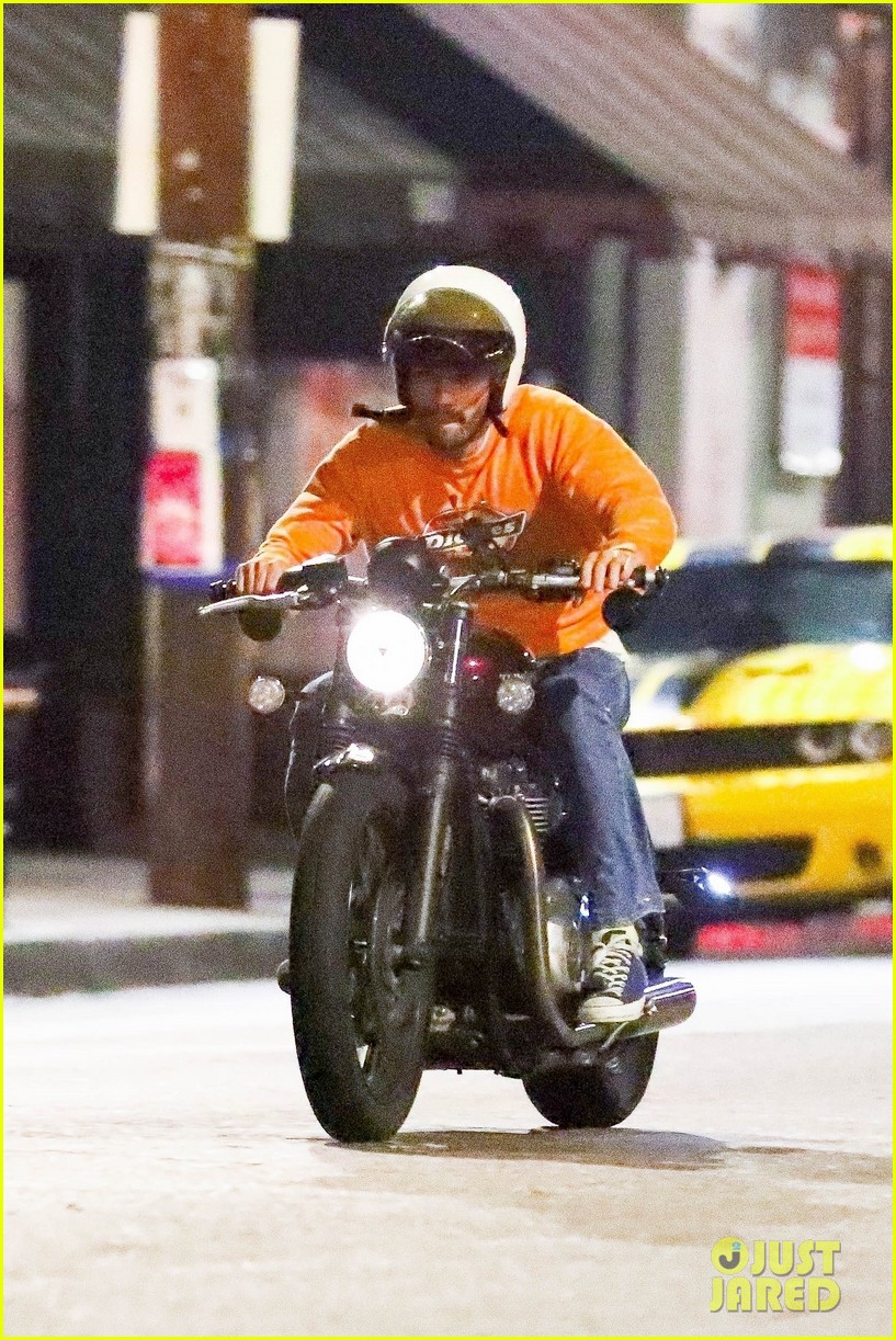 kj apa rides his motorcycle to dinner with friends 054595214