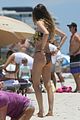 behati prinsloo at the beach while adam levine works out 21