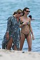 behati prinsloo at the beach while adam levine works out 31