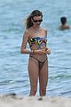 behati prinsloo at the beach while adam levine works out 32