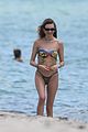 behati prinsloo at the beach while adam levine works out 36