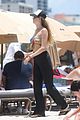 behati prinsloo at the beach while adam levine works out 40