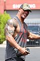 dwayne johnson ripped arm back muscles after gym sessions 01