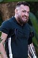 conor mcgregor uses crutches during family outing 04