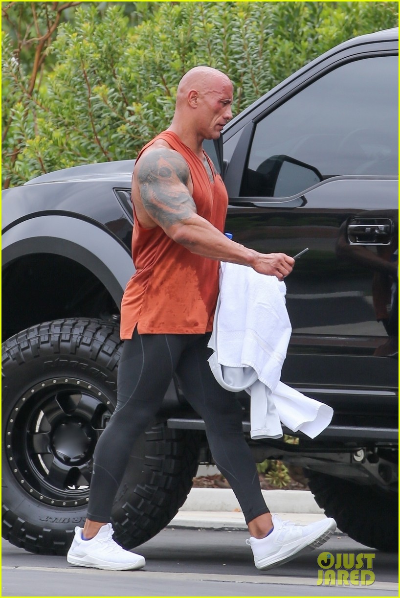 dwayne johnson drenched in sweat after workout 034608074