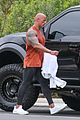 dwayne johnson drenched in sweat after workout 03