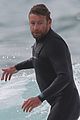 simon baker does some surfing in sydney 04