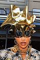 cardi b kisses offset wears gold headpiece paris 06