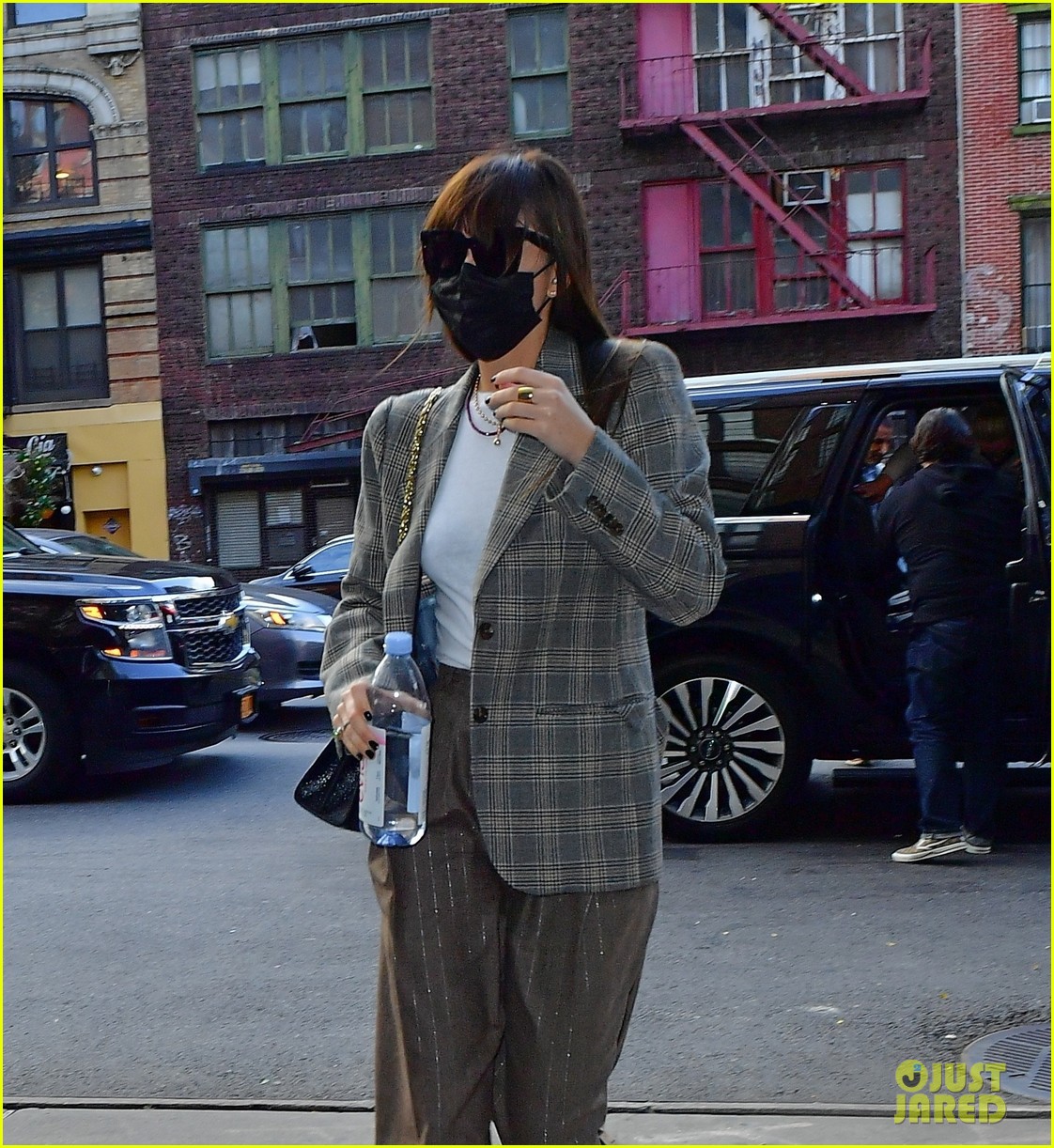 Dakota Johnson Looks Business Chic in a Plaid Blazer While in New York