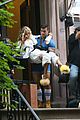 sarah jessica parker carried by hunky man on and just like that set 21