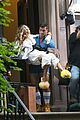sarah jessica parker carried by hunky man on and just like that set 22