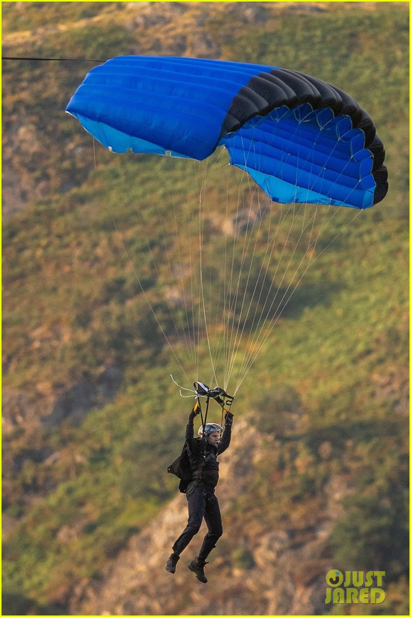 Tom Cruise Parachutes From a Helicopter While Filming Insane 'Mission