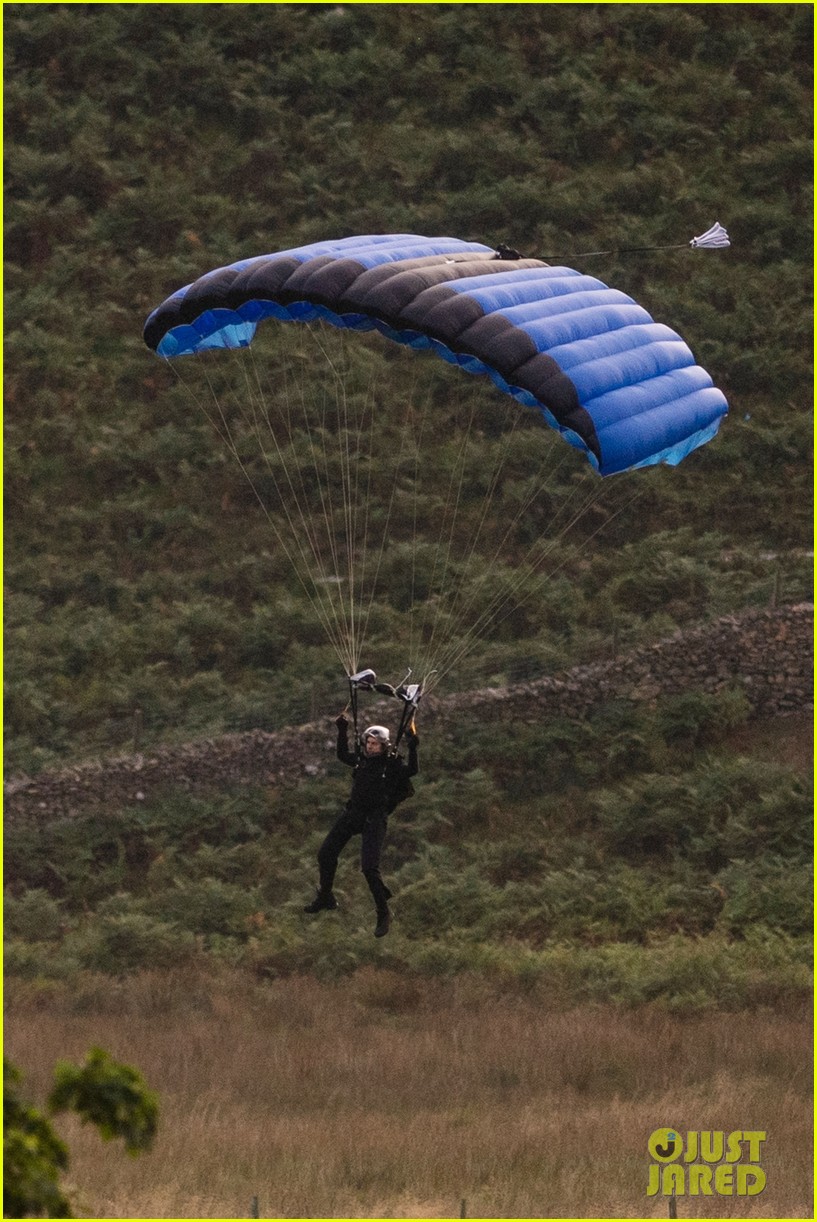 Tom Cruise Parachutes From a Helicopter While Filming Insane 'Mission