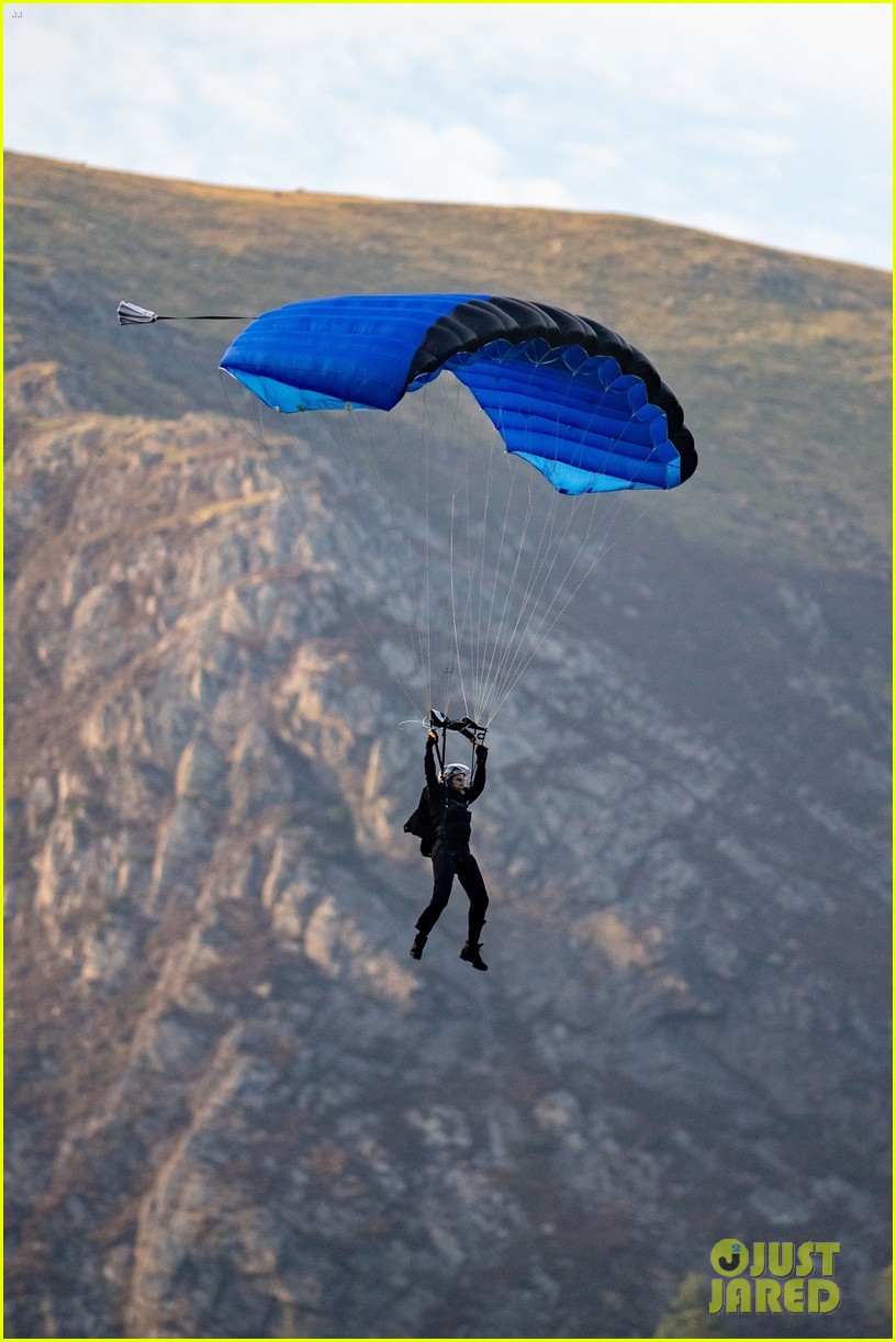 Tom Cruise Parachutes From a Helicopter While Filming Insane 'Mission
