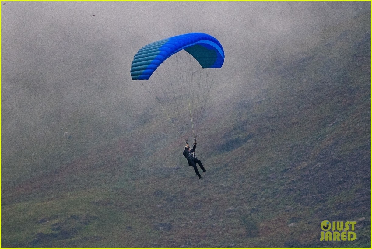 Tom Cruise Parachutes From a Helicopter While Filming Insane 'Mission