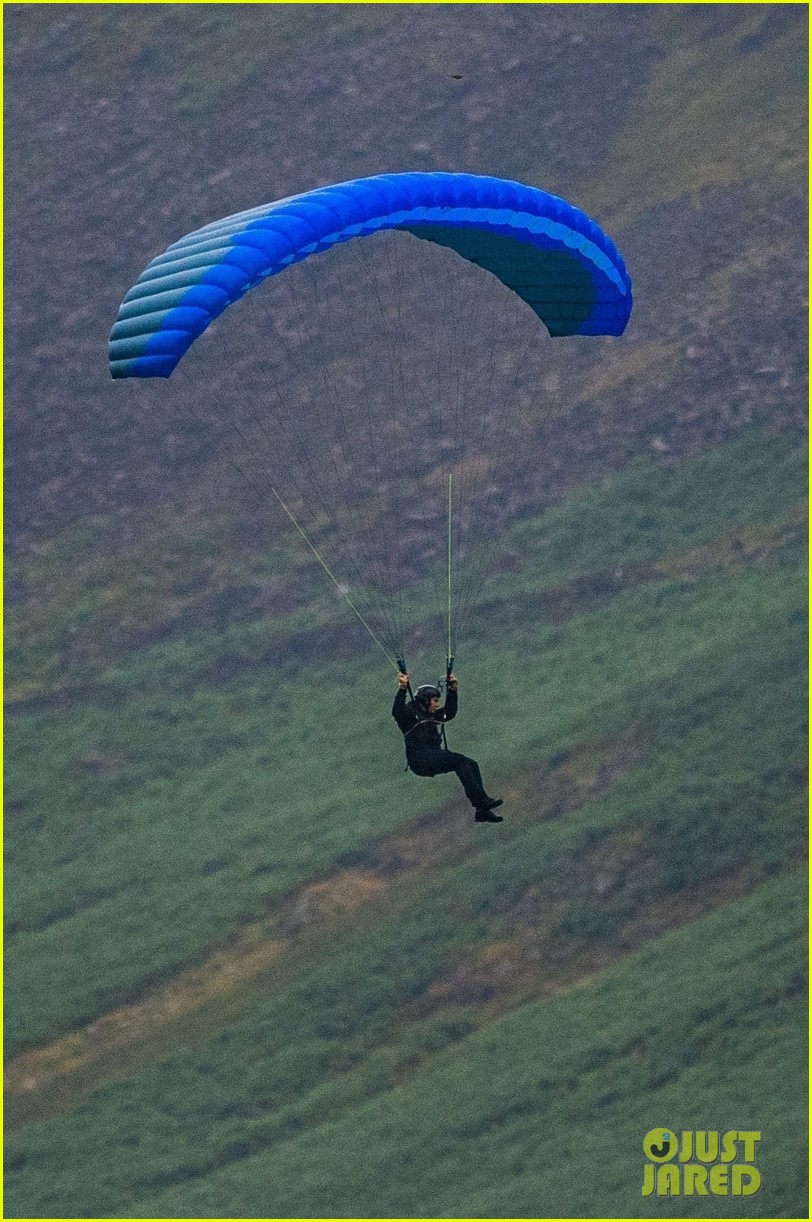 Tom Cruise Parachutes From a Helicopter While Filming Insane 'Mission