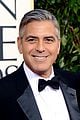 george clooney helps local como citizens after flood 01