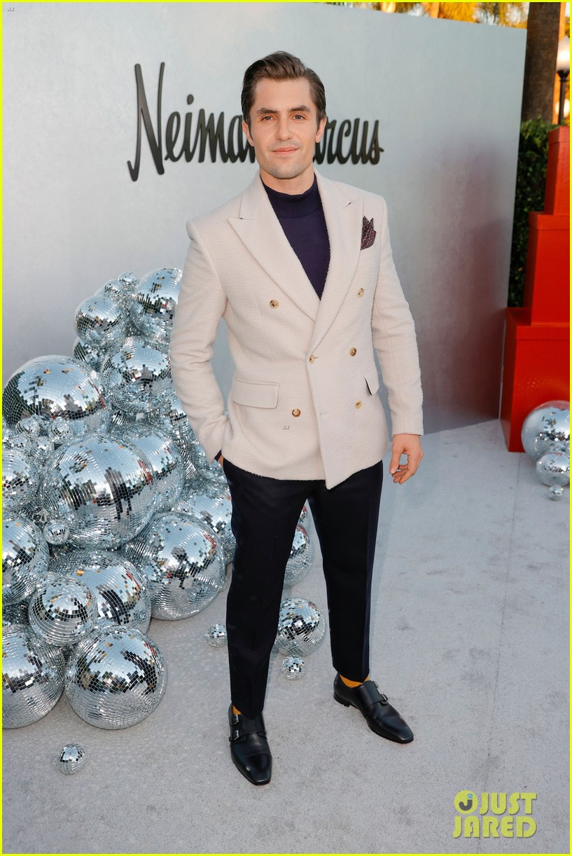 phil dunster juno temple neiman marcus holiday event 104651240