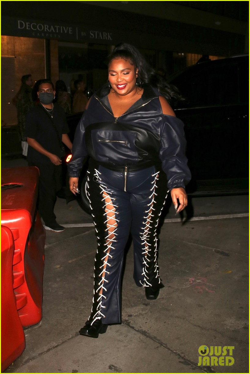 Photo lizzo rocks laced up leather pants for night out 07 Photo