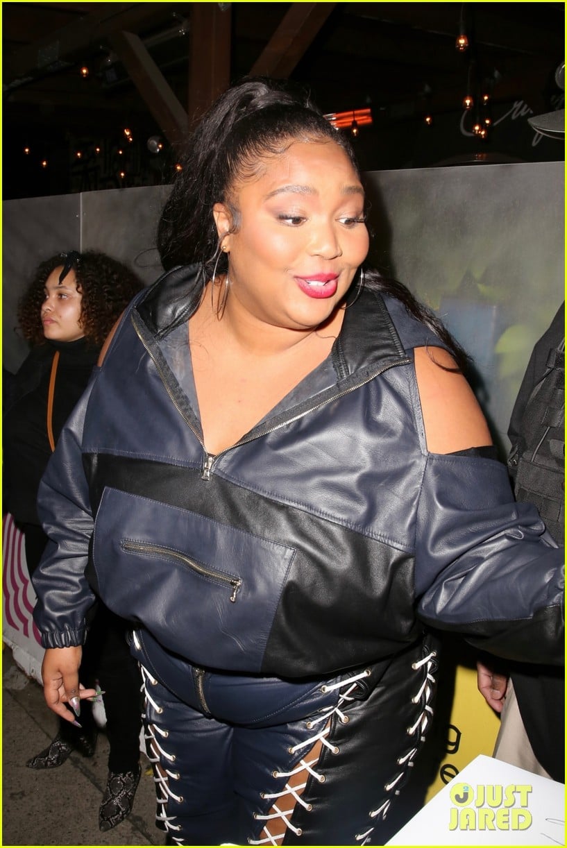 Photo lizzo rocks laced up leather pants for night out 09 Photo