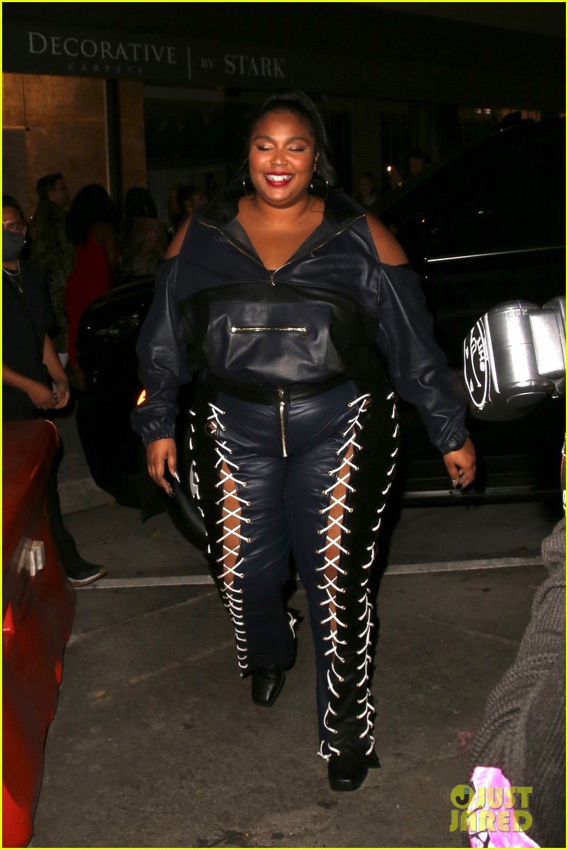 Photo lizzo rocks laced up leather pants for night out 13 Photo
