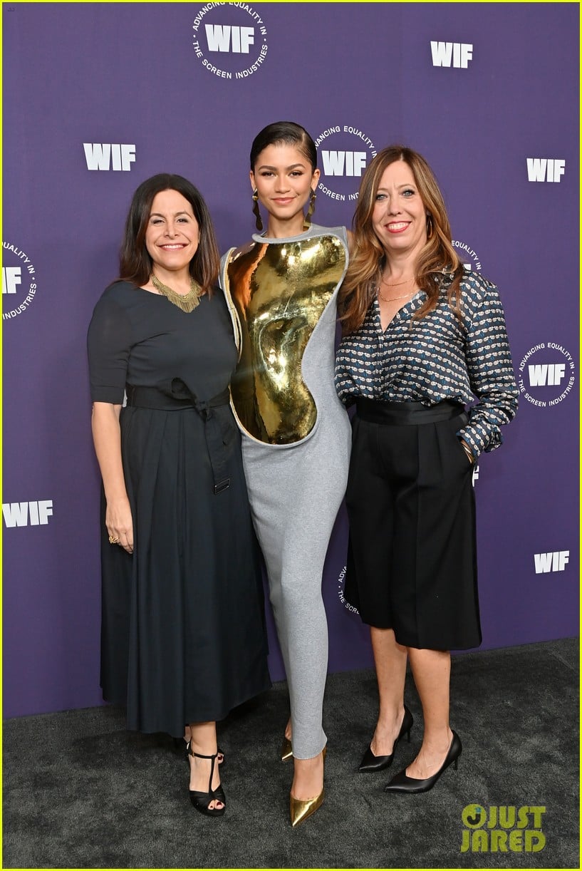 Zendaya Makes A Statement With Gold Breast Plate Dress at Women in Film