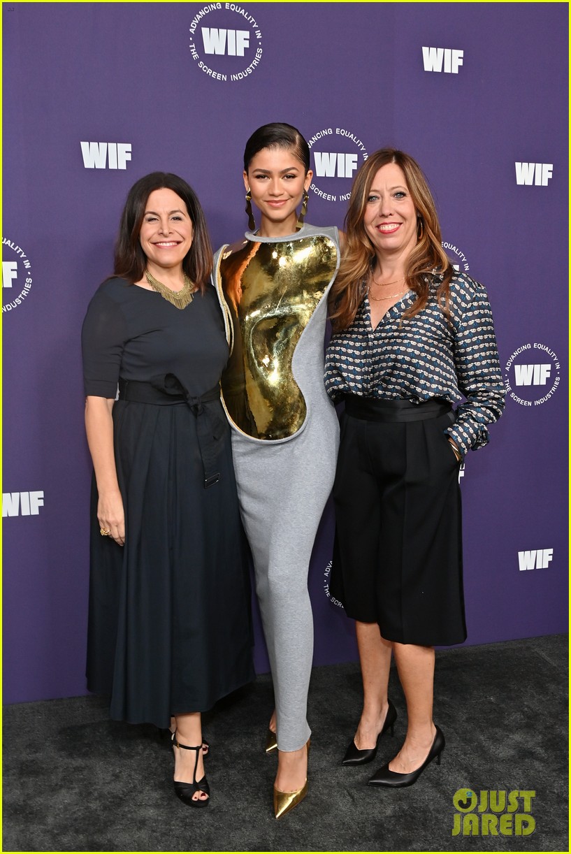 Zendaya Makes A Statement With Gold Breast Plate Dress at Women in Film