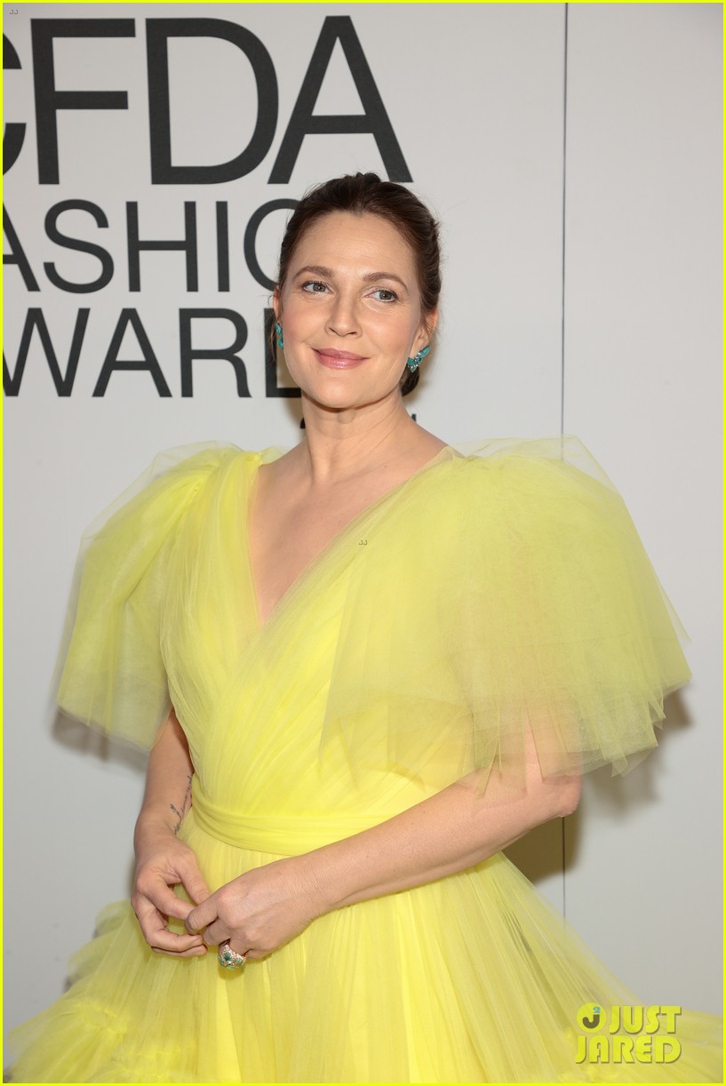 Emily Blunt Rocks a Tangerine Suit To Host CFDA Fashion Awards 2021