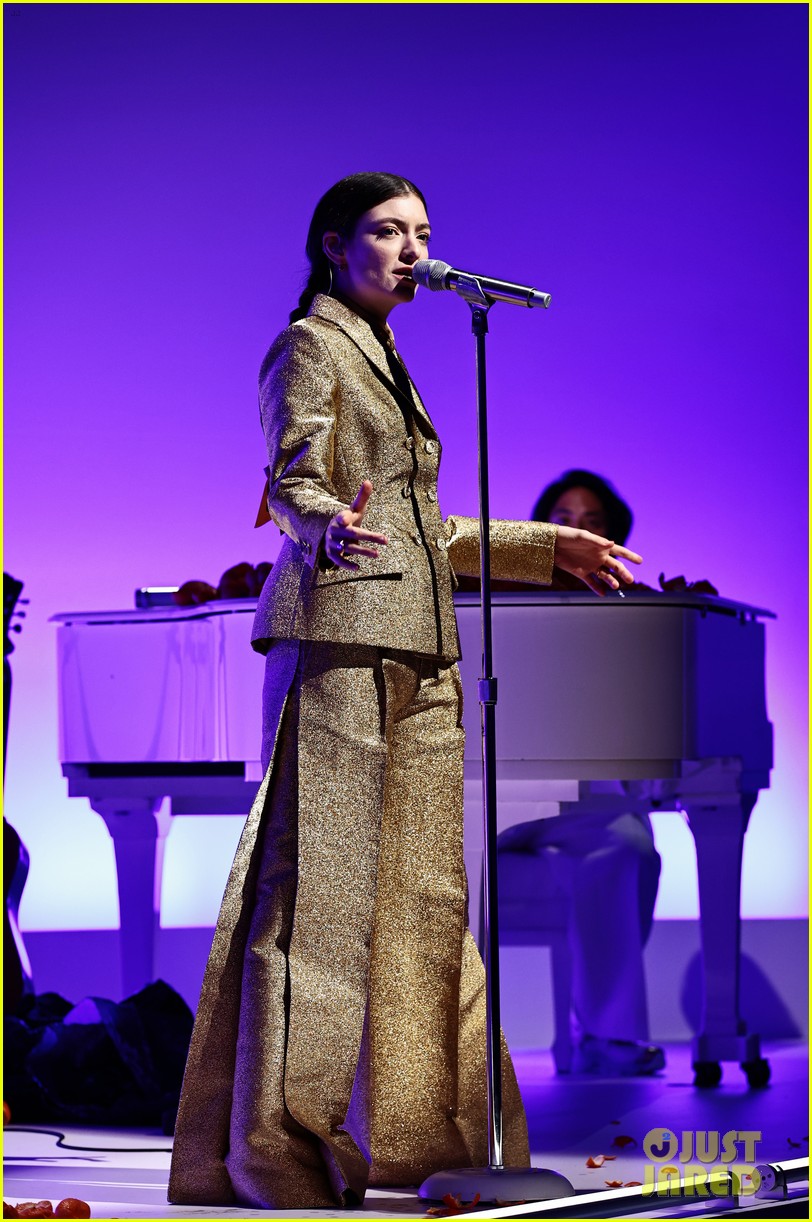 Lorde Dazzles in Gold Suit While Performing at Guggenheim International