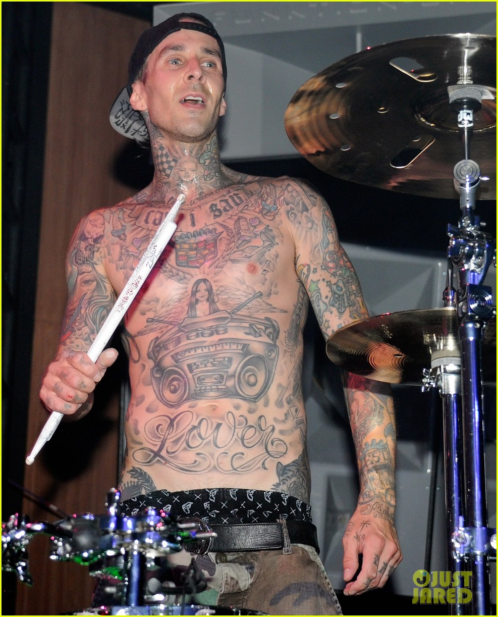 travis barker fires back at criticism of his tattoos 124671766