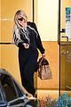 khloe kardashian goes cozy fuzzy jumpsuit leaving photo shoot 24