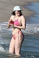 noah cyrus rocks pink bikini for day at the beach 02