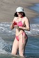 noah cyrus rocks pink bikini for day at the beach 08