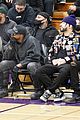kanye west sits courtside with french montana donda basketball game 23