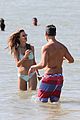 alessandra ambrosio richard lee show off some cute pda at the beach 14