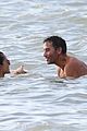 alessandra ambrosio richard lee show off some cute pda at the beach 56