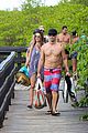 alessandra ambrosio richard lee show off some cute pda at the beach 99